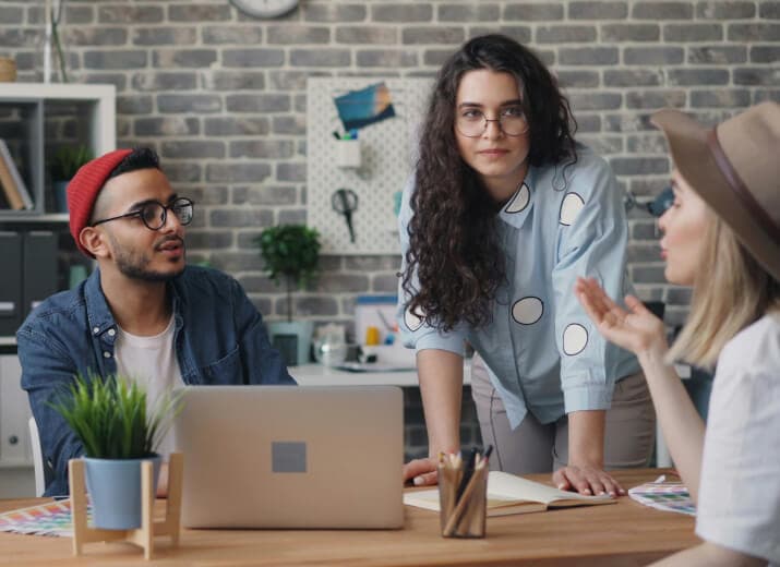 A collaborative product team reviewing work