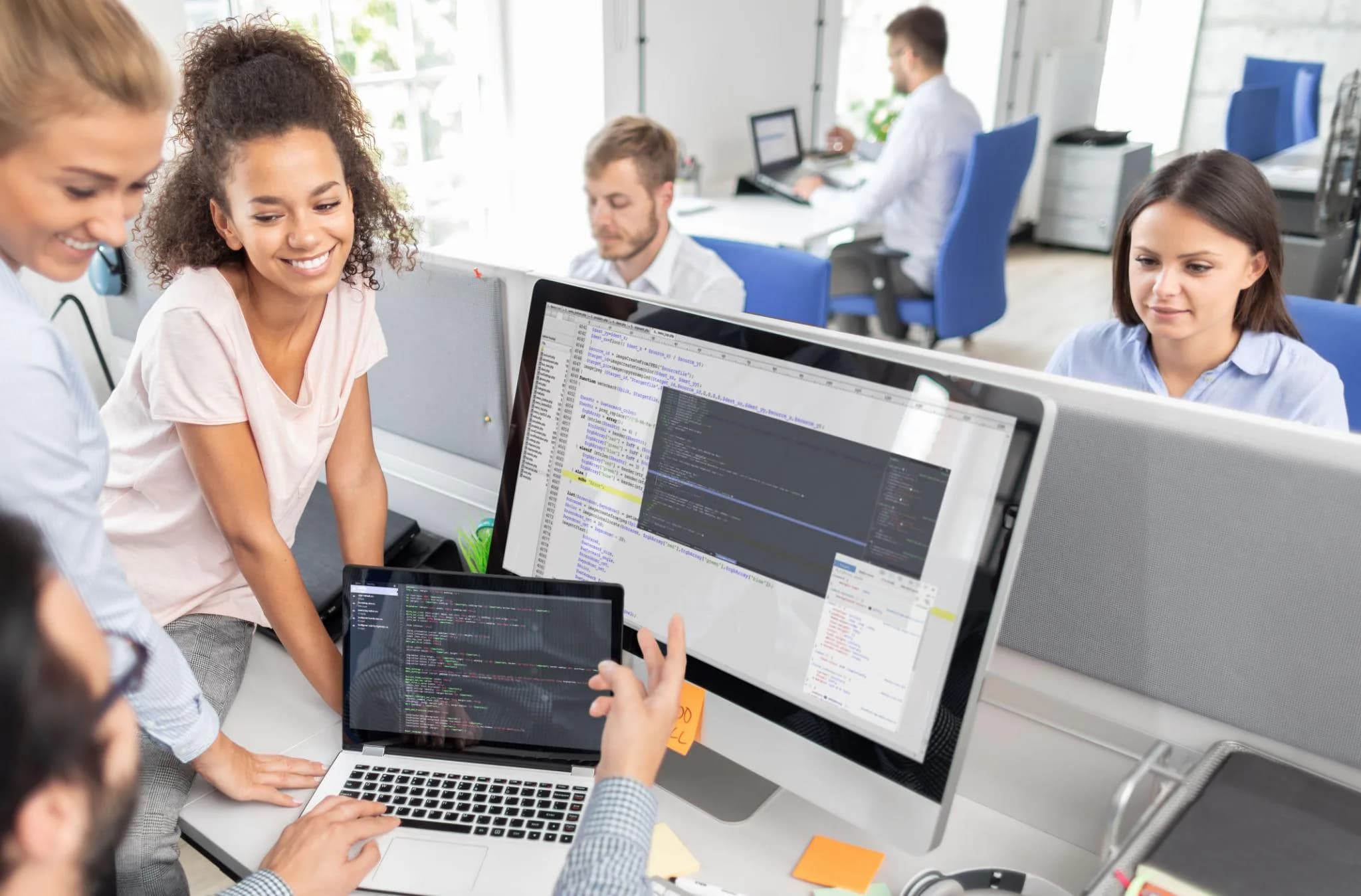 Professional web design and software development team working on a business website.